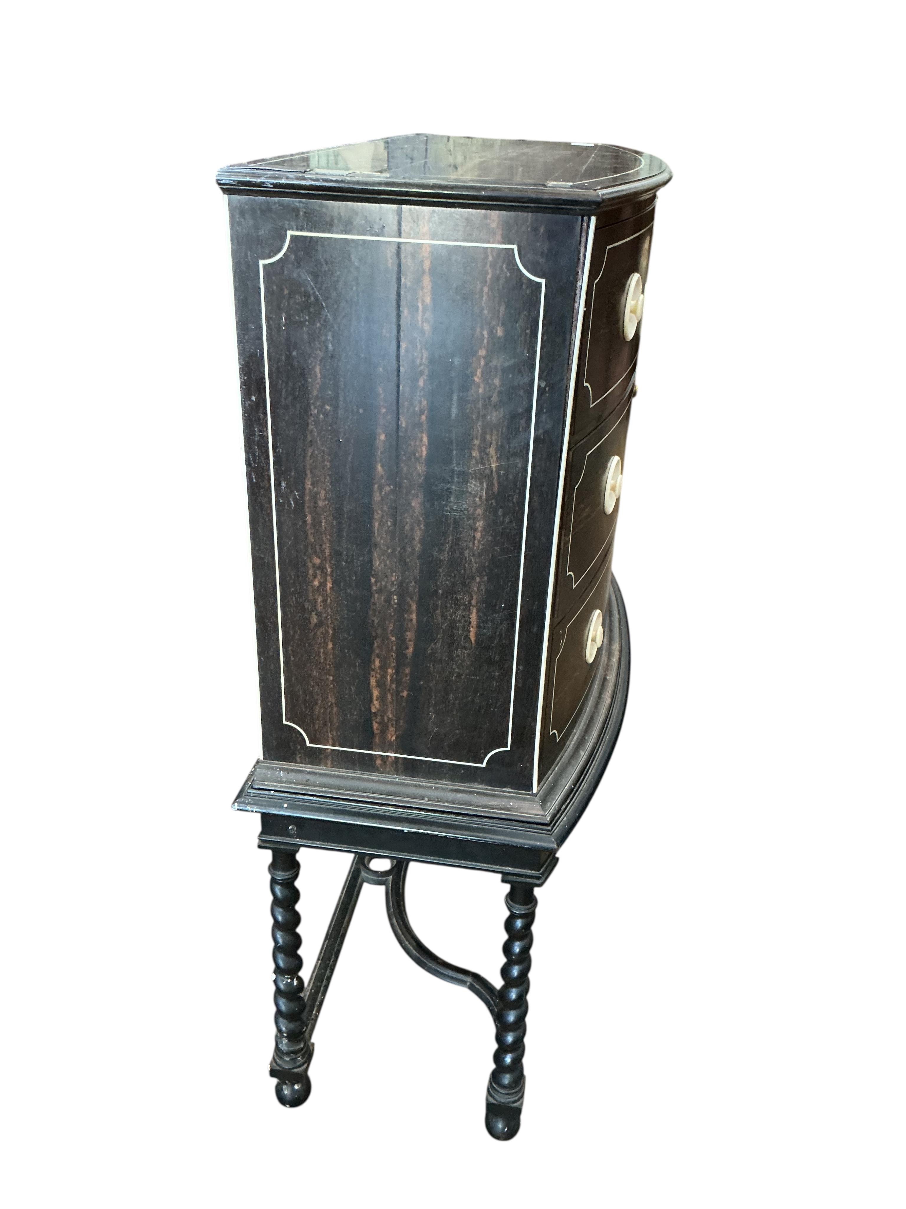 An early 20th century ivory mounted coromandel three drawer bowfront chest, stamped Callow of Mount Street, London